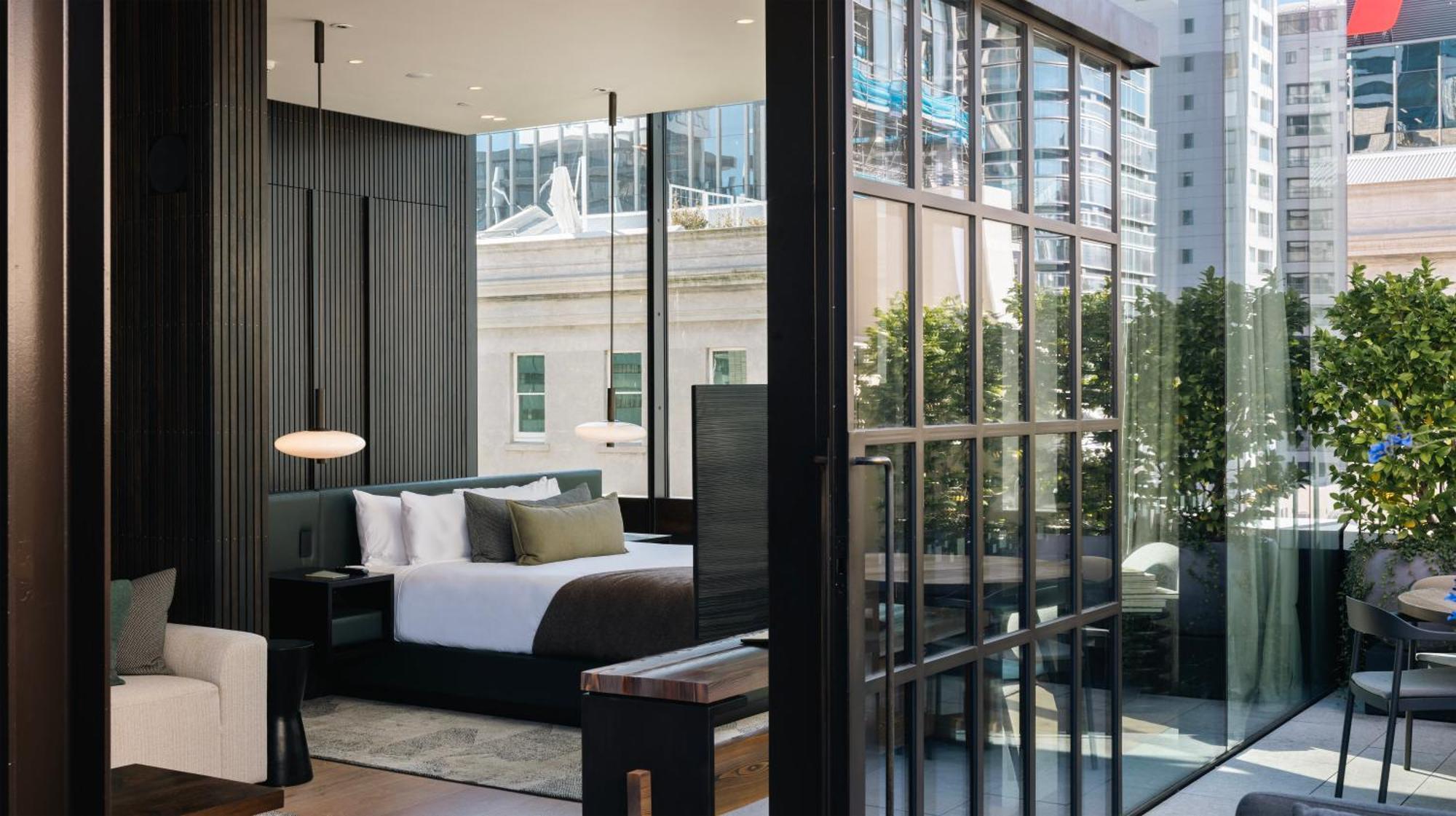 The Hotel Britomart Auckland Kültér fotó The bedroom of a suite at The Hari